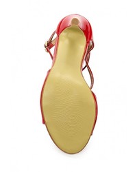 Красные кожаные босоножки на каблуке от Raxmax