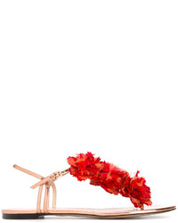 Красные кожаные сандалии на плоской подошве с украшением от Charlotte Olympia