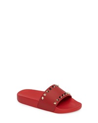 Красные кожаные сандалии на плоской подошве с шипами