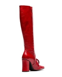 Красные кожаные сапоги от Dorateymur