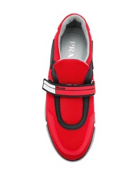 Женские красные кроссовки от Prada
