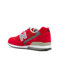 Мужские красные низкие кеды из плотной ткани от New Balance