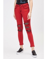 Красные рваные джинсы скинни от DSHE