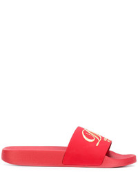 Красные резиновые сандалии на плоской подошве от Dolce & Gabbana