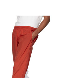 Мужские красные спортивные штаны с принтом от adidas Originals