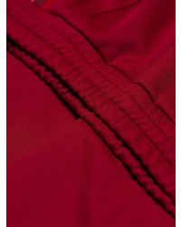 Женские красные спортивные штаны от Moncler