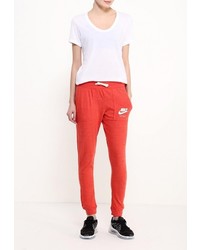 Женские красные спортивные штаны от Nike