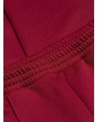 Женские красные спортивные штаны от Moncler