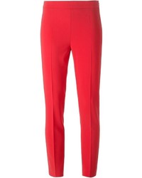 Красные узкие брюки от Moschino