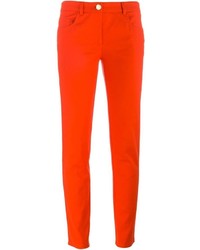 Красные узкие брюки от Moschino