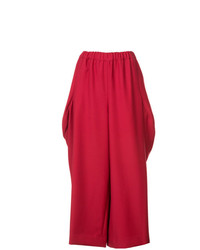 Красные широкие брюки от Comme des Garcons
