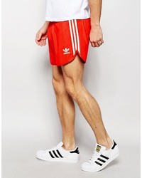 Мужские красные шорты от adidas