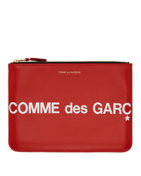 Красный кожаный клатч с принтом от Comme des Garcons Wallets