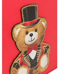 Красный кожаный клатч с принтом от Moschino