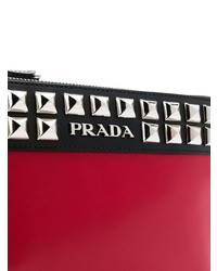 Красный кожаный клатч с шипами от Prada