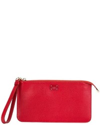 Красный кожаный клатч от Dolce & Gabbana