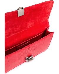 Красный кожаный клатч от Alexander McQueen