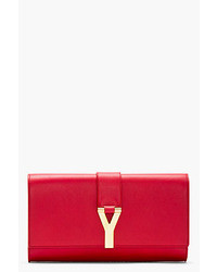 Красный кожаный клатч от Saint Laurent
