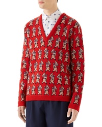 Красный свитер с v-образным вырезом с принтом