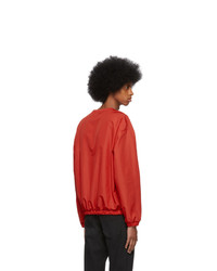 Мужской красный свитер с круглым вырезом от Pyer Moss