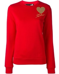 Женский красный свитер с пайетками от Love Moschino