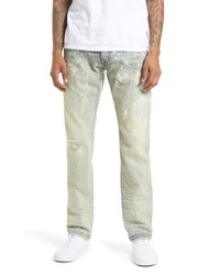 Мятные рваные джинсы