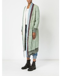 Женский мятный пуховик от Greg Lauren