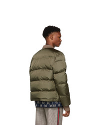 Мужская оливковая куртка-пуховик с вышивкой от Gucci