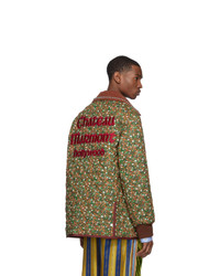 Мужская оливковая куртка-пуховик с цветочным принтом от Gucci