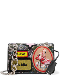 Оливковая сумка через плечо с цветочным принтом от Miu Miu
