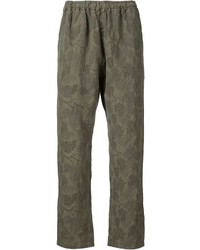 Мужские оливковые брюки с камуфляжным принтом от White Mountaineering