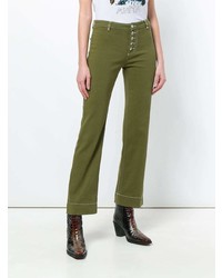 Оливковые джинсы-клеш от Alexa Chung