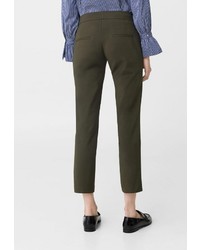 Оливковые узкие брюки от Mango