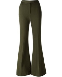 Оливковые шерстяные брюки-клеш от Alexander McQueen