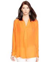 Оранжевая блузка с длинным рукавом