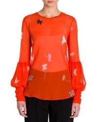 Оранжевая блузка с длинным рукавом с цветочным принтом
