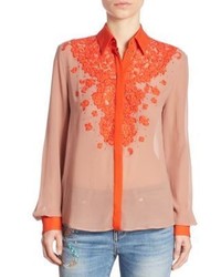 Оранжевая блузка с цветочным принтом