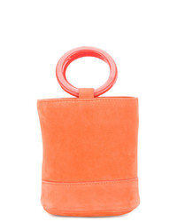 Оранжевая замшевая сумка-мешок от Simon Miller