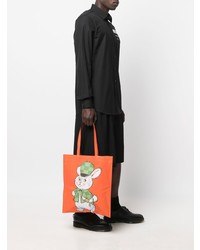 Мужская оранжевая кожаная большая сумка с принтом от Moschino