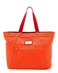 Оранжевая кожаная большая сумка от adidas by Stella McCartney