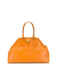 Оранжевая кожаная большая сумка от Gucci