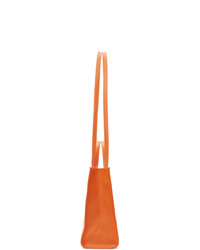 Мужская оранжевая кожаная большая сумка от Telfar