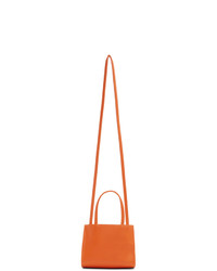 Мужская оранжевая кожаная большая сумка от Telfar