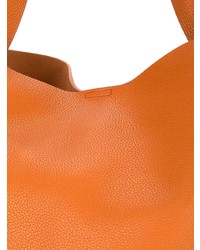 Оранжевая кожаная большая сумка от Jil Sander