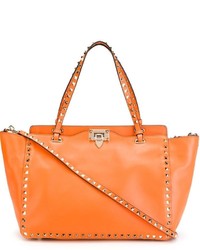 Оранжевая кожаная большая сумка от Valentino Garavani