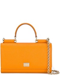 Оранжевая кожаная сумка-саквояж от Dolce & Gabbana