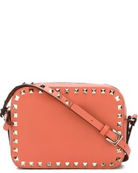 Оранжевая кожаная сумка через плечо от Valentino Garavani