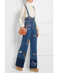 Женская оранжевая кожаная сумка от Valentino