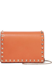 Женская оранжевая кожаная сумка от Valentino