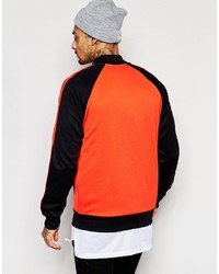 Мужская оранжевая куртка от adidas